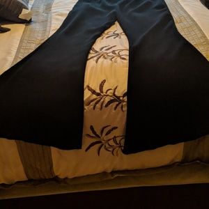 Dressy pants with extra wide bottoms